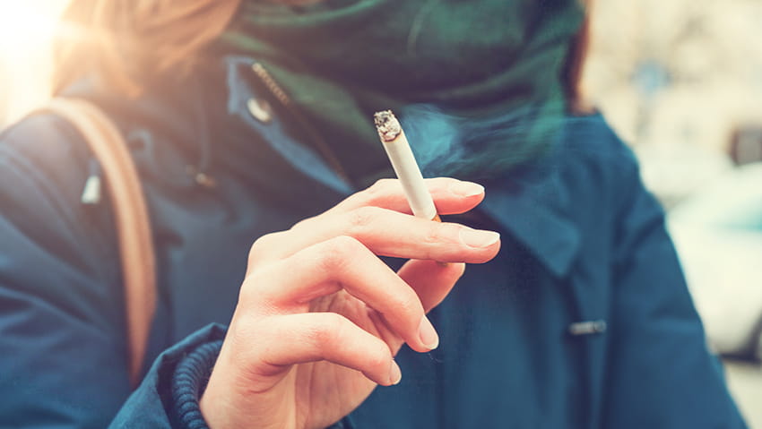 woman smoking a cigarette 